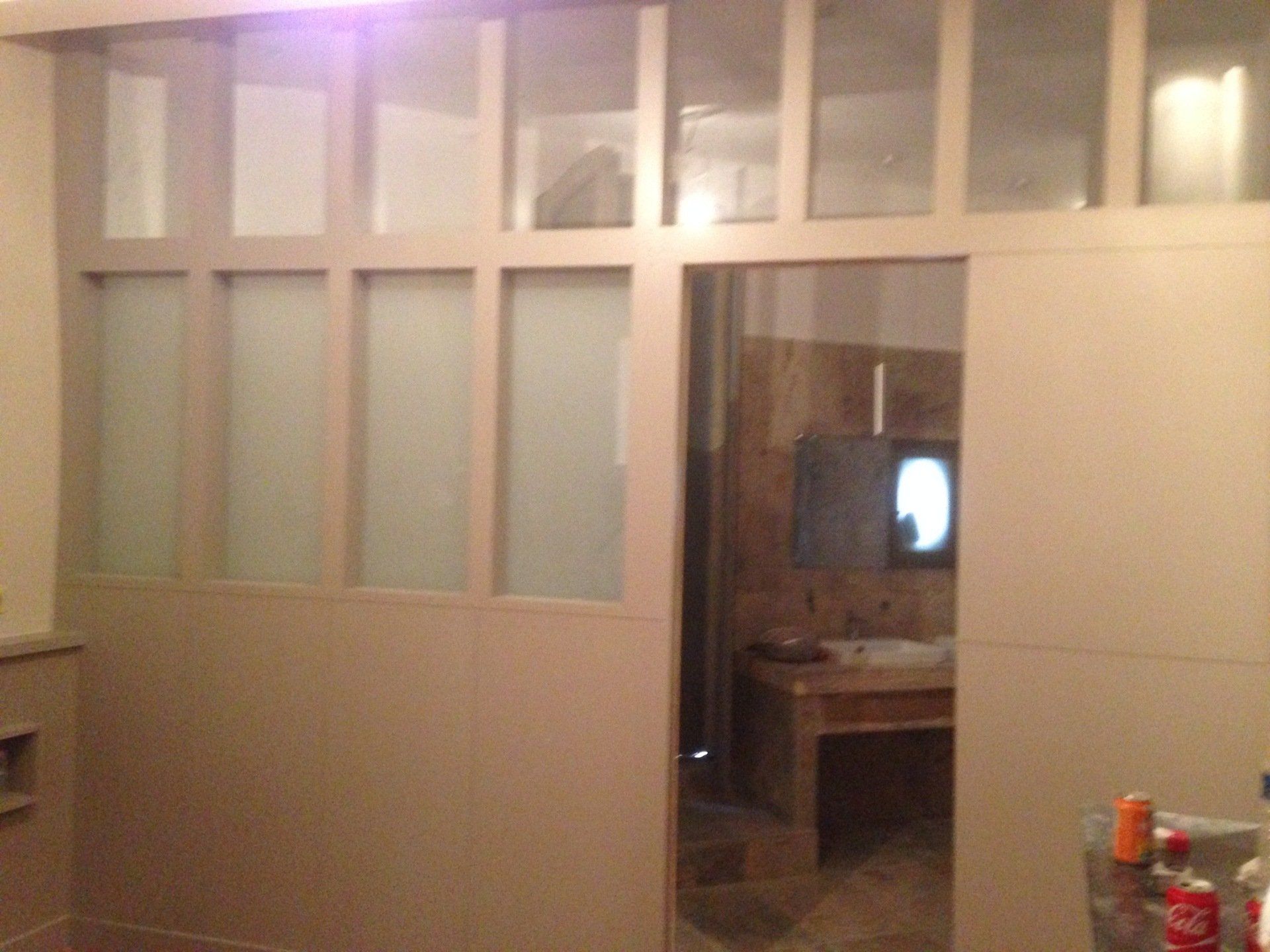 Aménagement de cloison vitrée