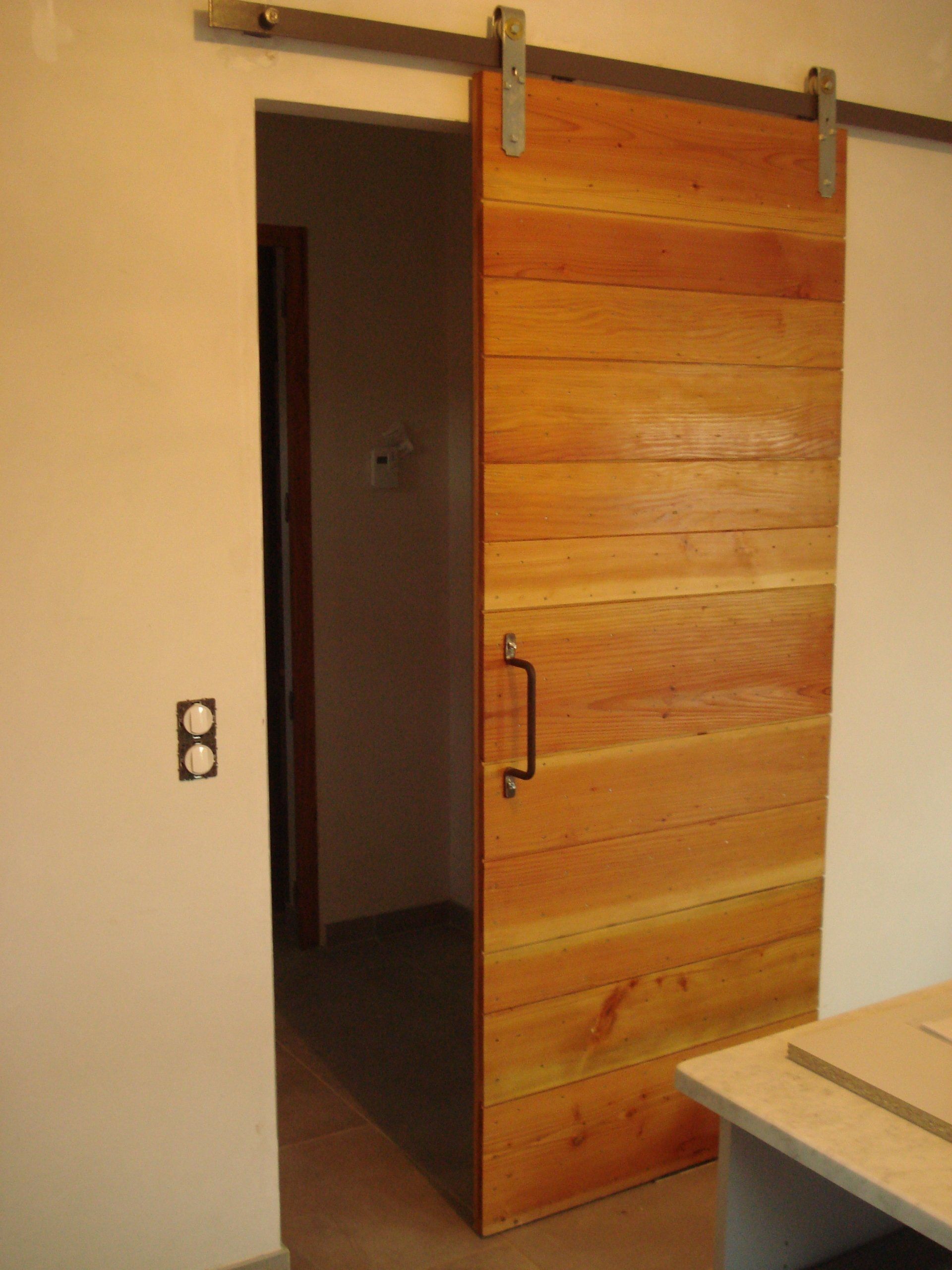 Porte de passage coulissante