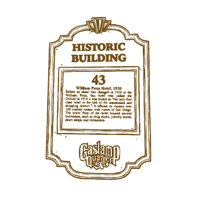 Historic building plaque, number 43, with brown text and decorative border.