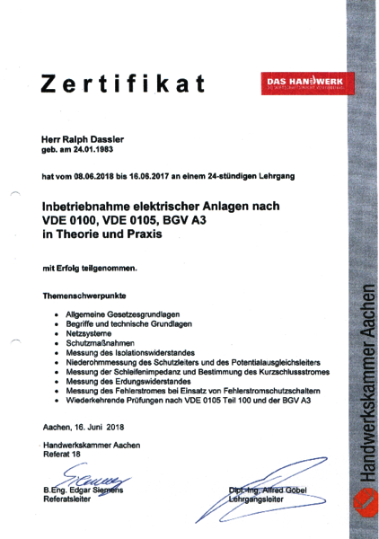 Ein Zertifikat mit der Aufschrift „Zertifikat“ ist von zwei Personen unterschrieben.