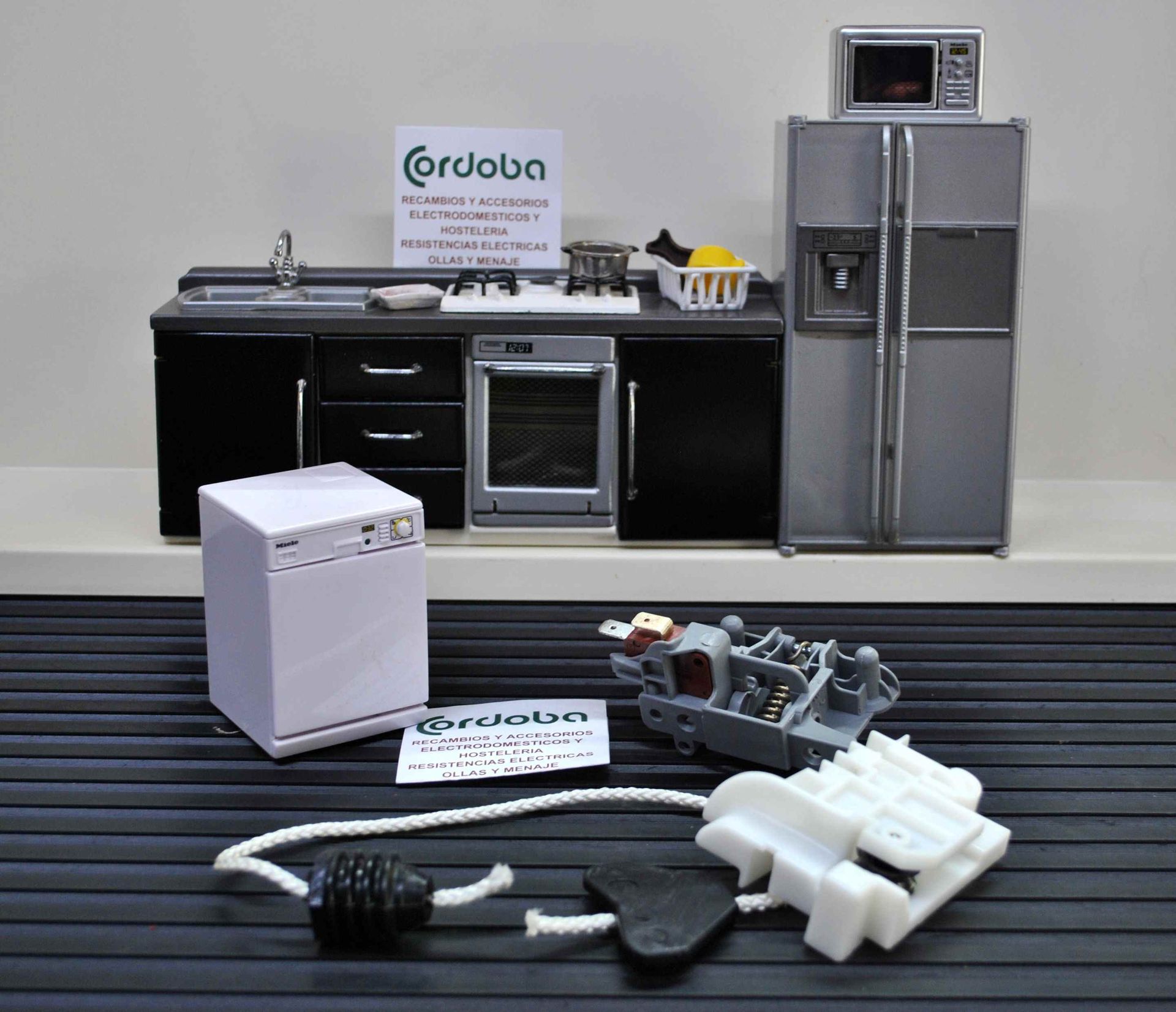 Una cocina con electrodomésticos y un cartel que dice cordoba