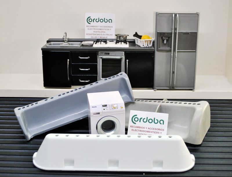 Una cocina con electrodomésticos y un cartel que dice cordoba