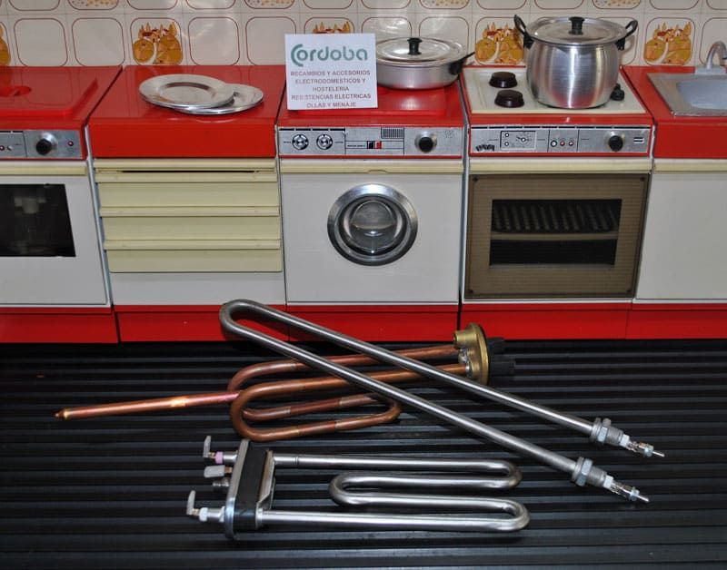 Una cocina con electrodomésticos y un cartel que dice @roolive