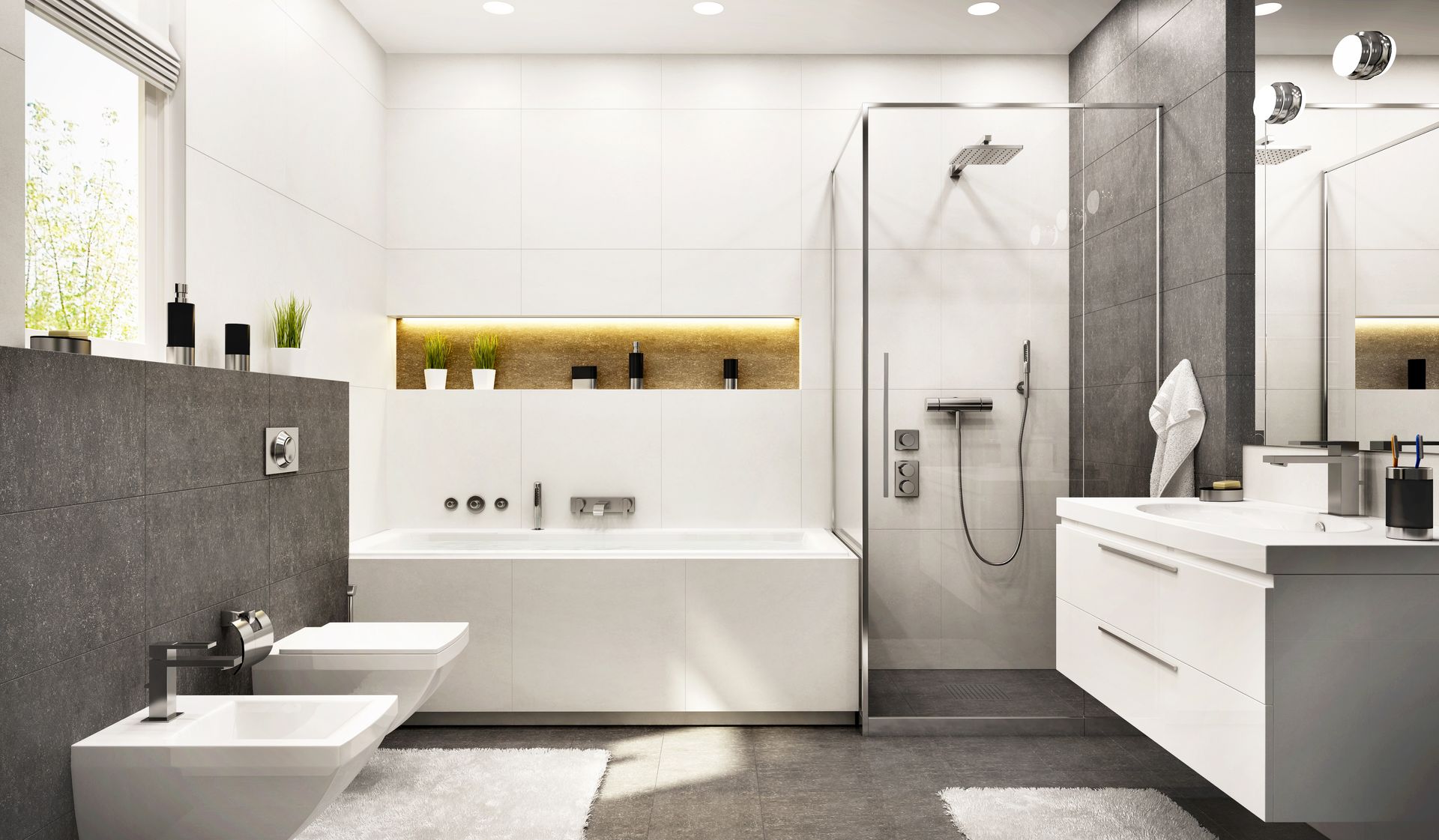 Salle de bains moderne blanche avec des touches de gris, comprenant une baignoire, une douche et des toilettes.