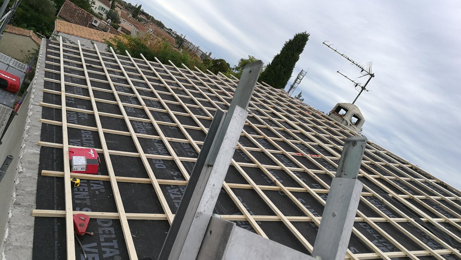 Préparation de la couverture pour la pose de tuiles