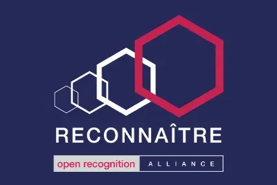 Logo avec des hexagones imbriqués blancs et rouges au-dessus du mot « RECONNAÎTRE » et « open recognition ALLIANCE » en dessous.