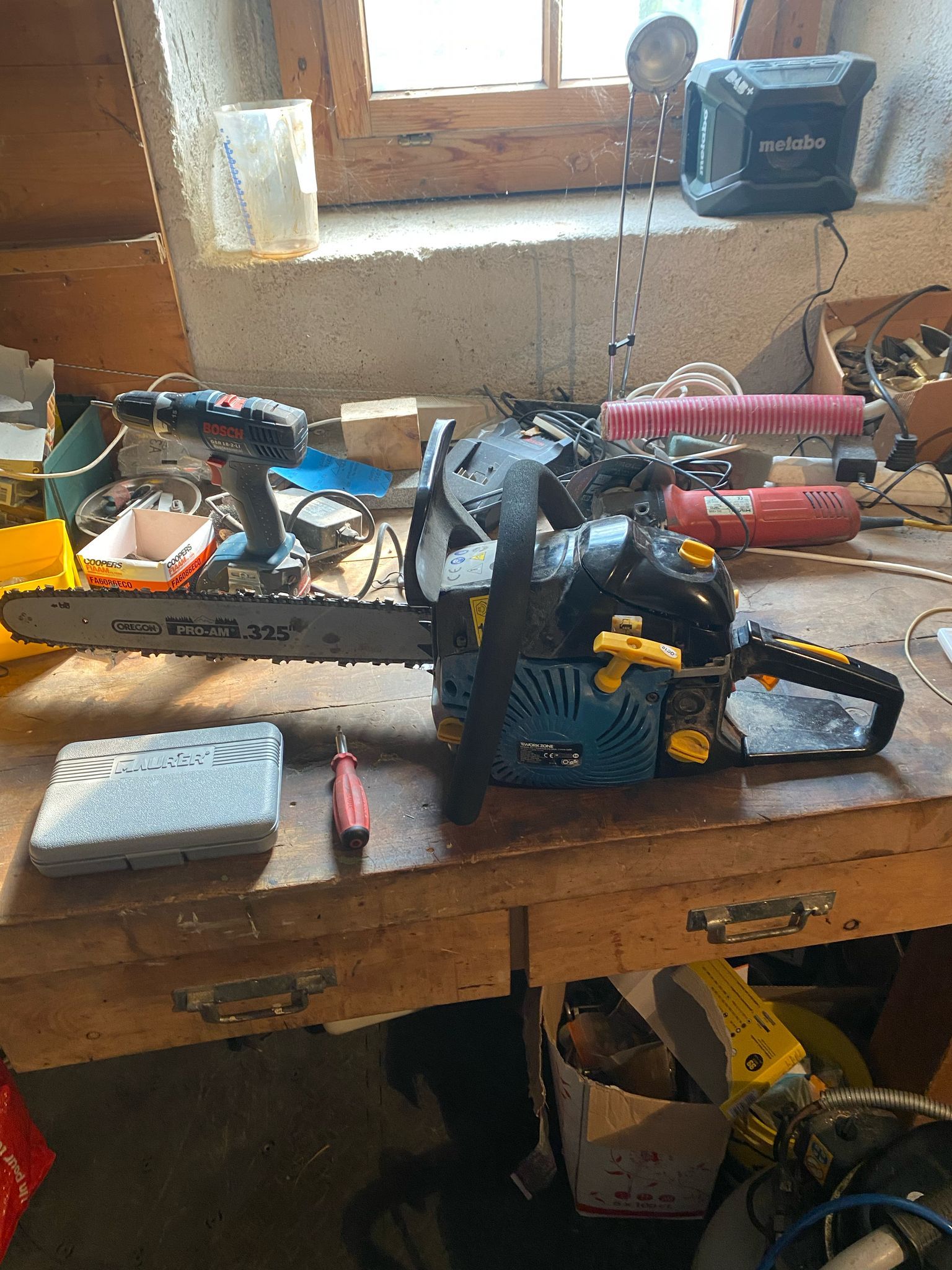 réparation tronçonneuse Workzone