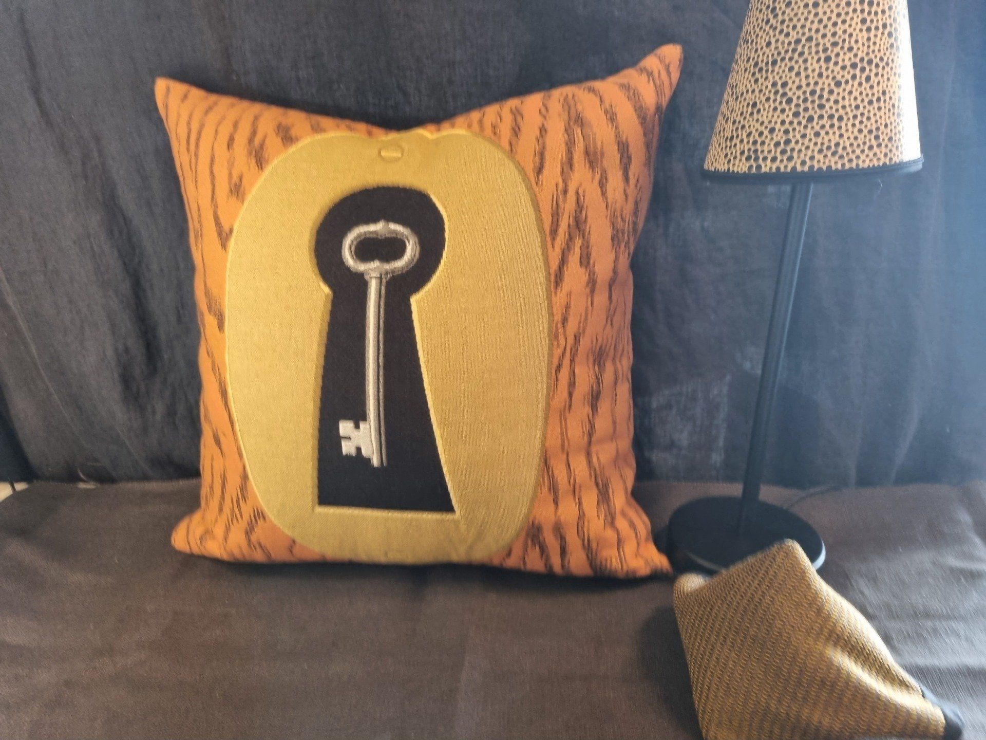 Coussin motif clé