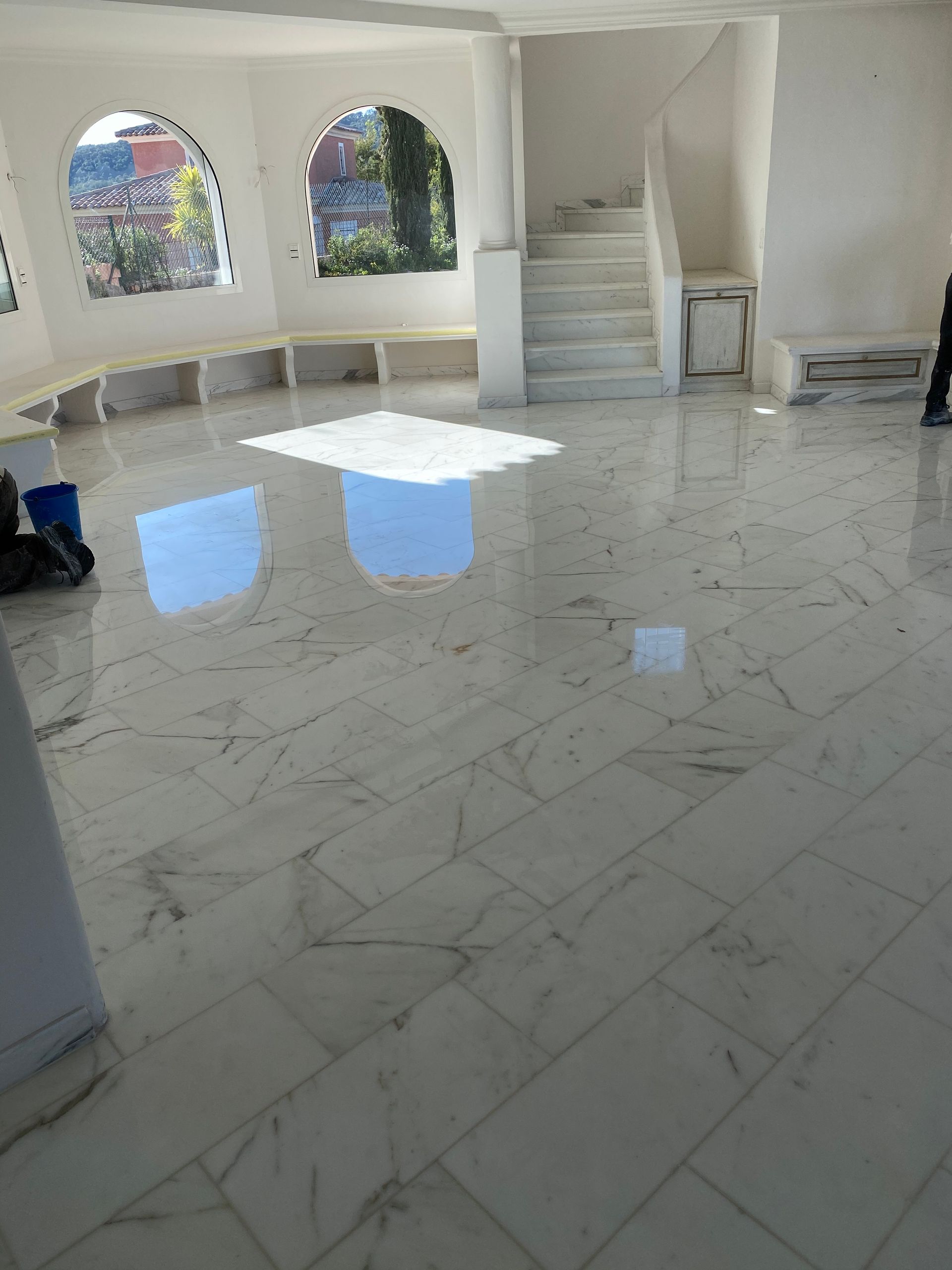 Lustrage carreaux de marbre