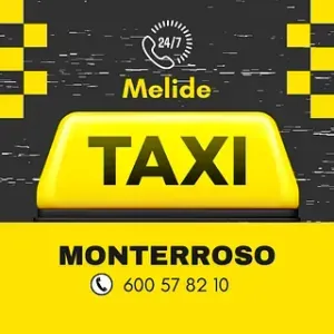 Un cartel amarillo que dice taxi.