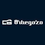 Un logotipo para una empresa llamada orbegozo sobre un fondo azul oscuro.