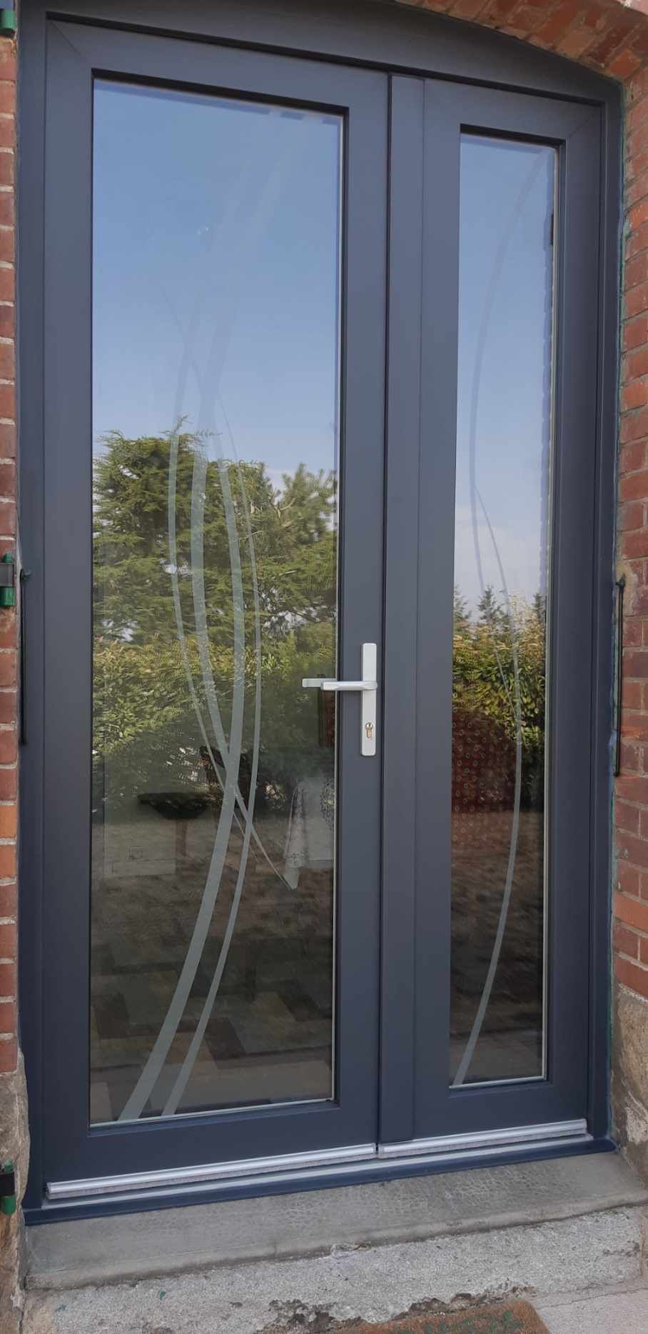 Porte d'entrée vitrée