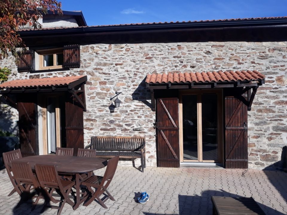 Terrasse avec baie vitrée