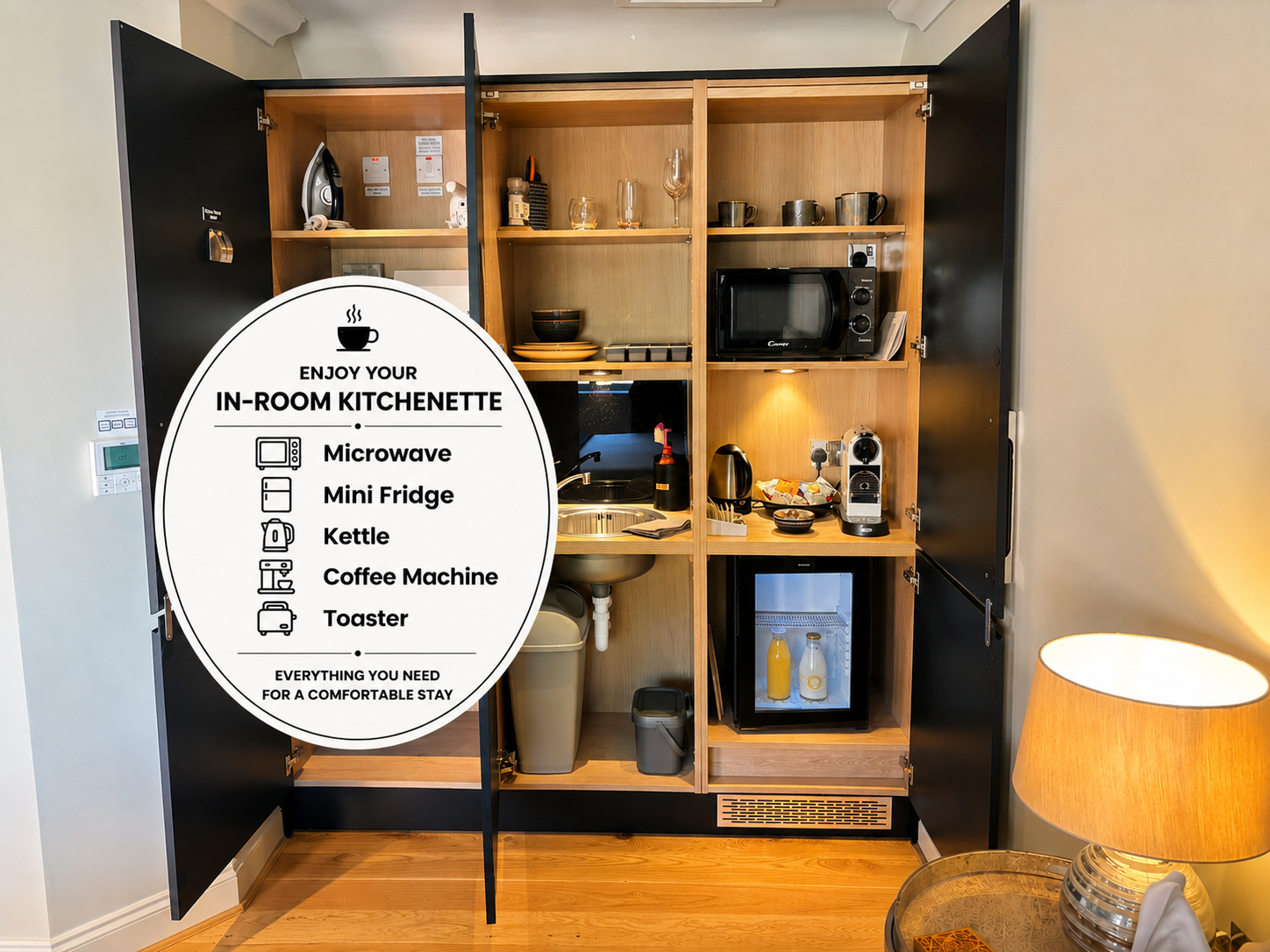 Image shows the layout of the Kitchenette at Hillside Farm apartments with Microwave, Fridge, Coffee Machine, Toaster and Kettle