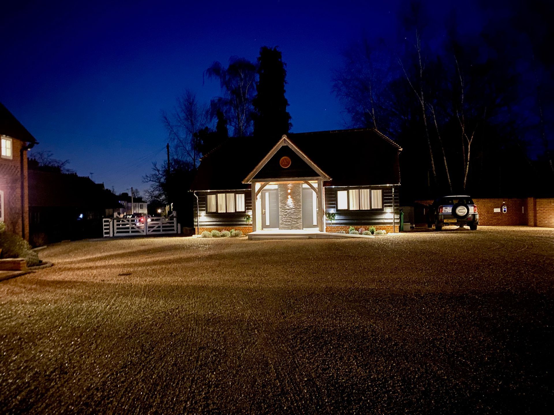 Image showing Hillside Farm Apartments lit up at night 