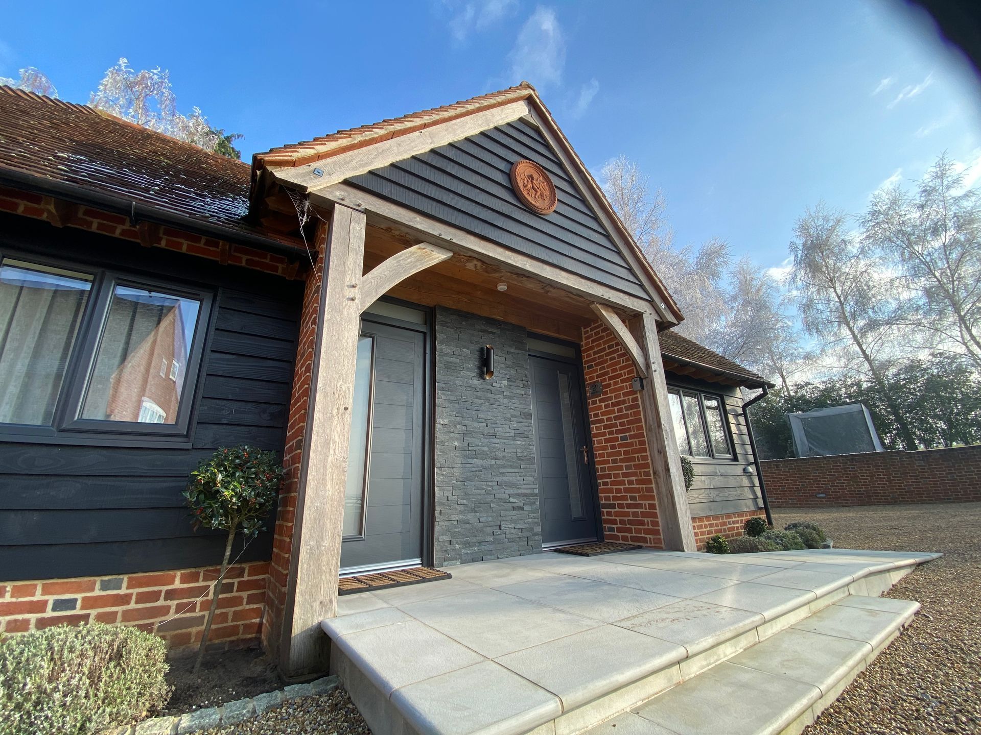 Image shows the front entrance doors to Hillside Farm Barn Apartments