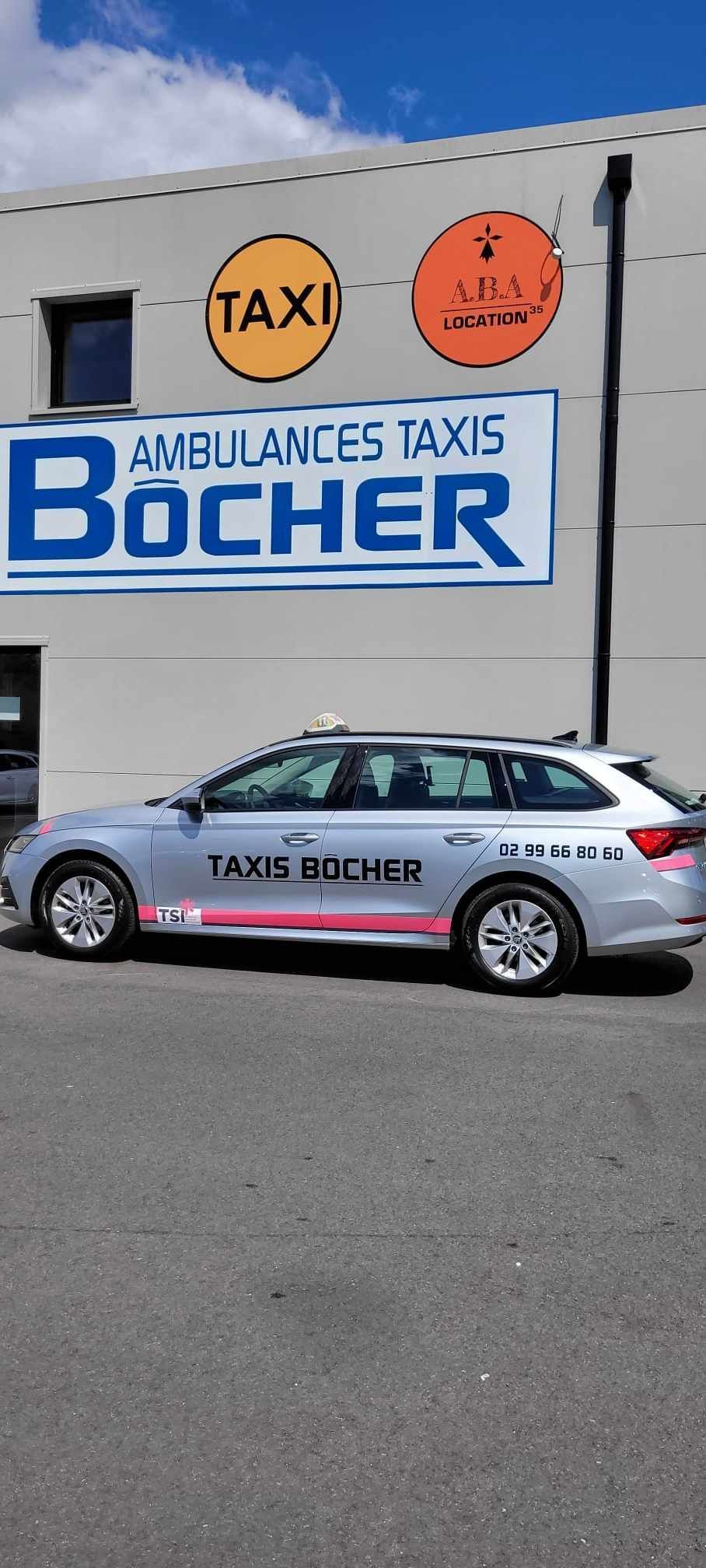 Un taxi est stationné devant l'agence d'Ambulances Taxis Bocher, sous un ciel bleu.