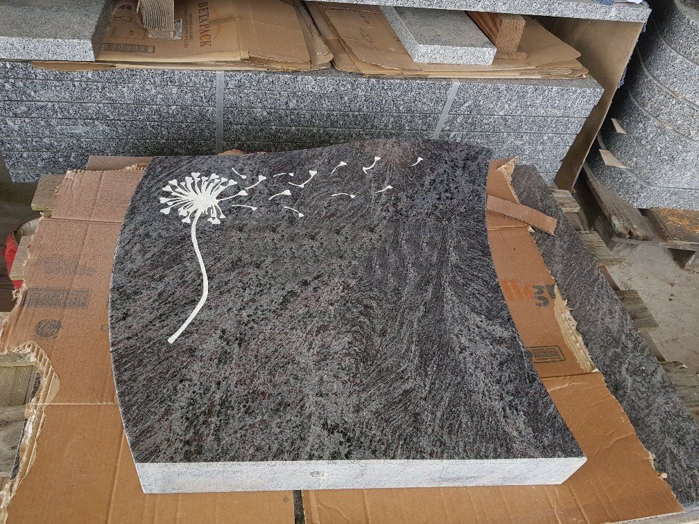 Monument funéraire avec pissenlit