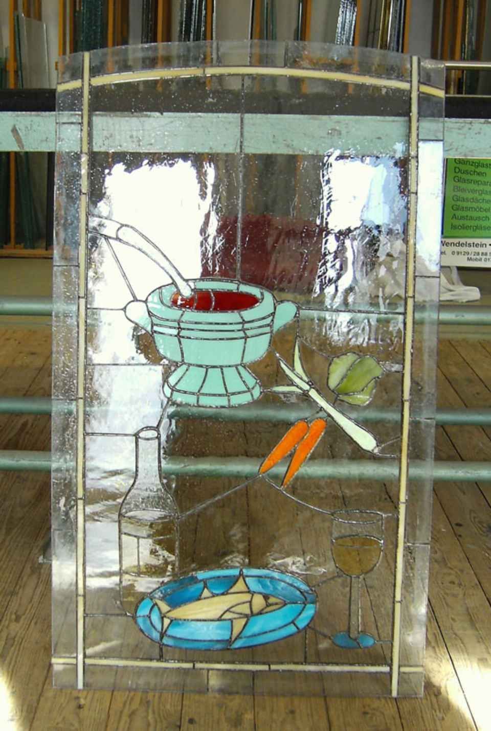 kunstvolle Verglasung mit Essensmotiven