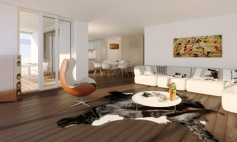 Un salon avec un tapis en peau de vache au sol