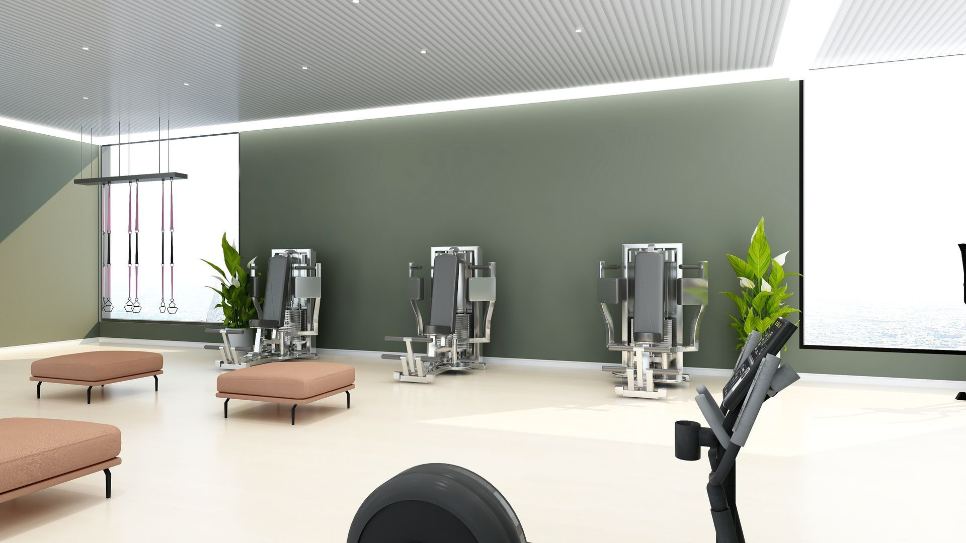 Salle de sport moderne dans les tons de vert.