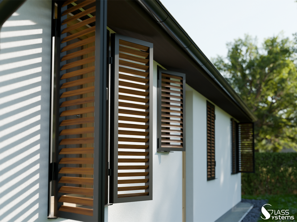 Fenêtres avec volets en bois marron