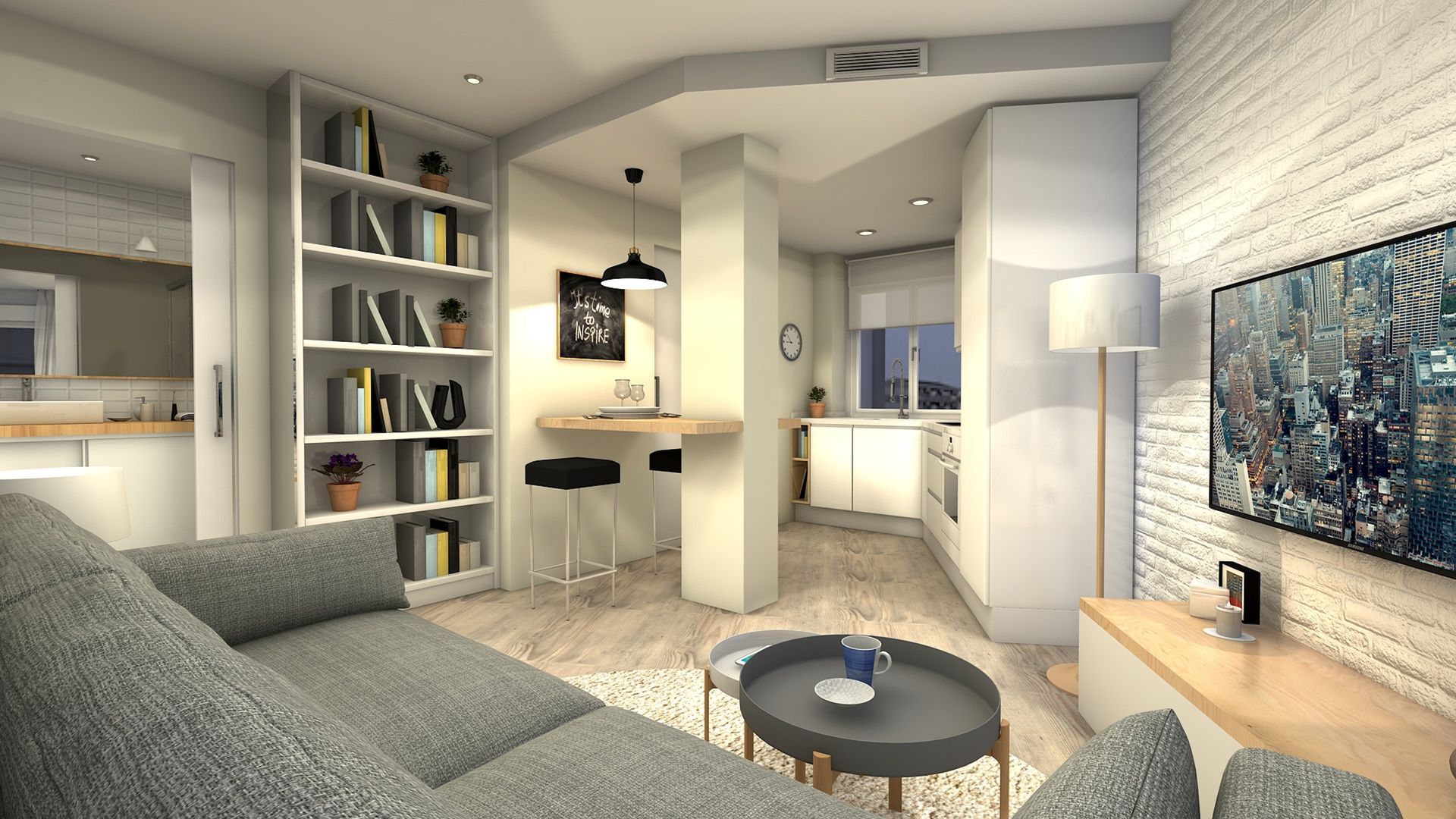 Espace de vie chaleureux avec canapé gris, bibliothèque et petite cuisine. Murs blancs et parquet.