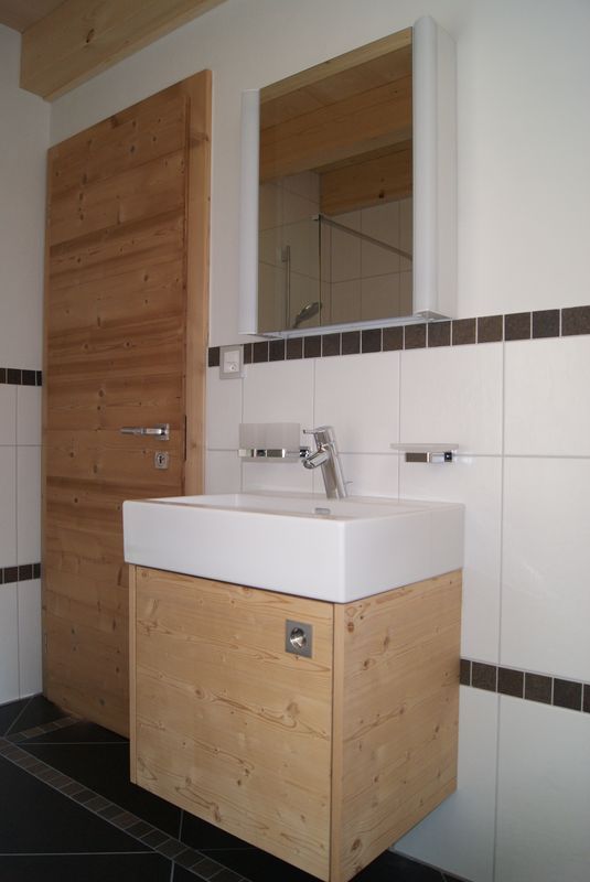 Chambovey Edouard ébénisterie menuiserie - tête de lit sur mesure