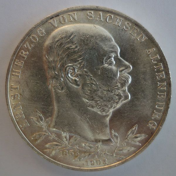 Silbermünze mit Profilporträt, Text am Rand.