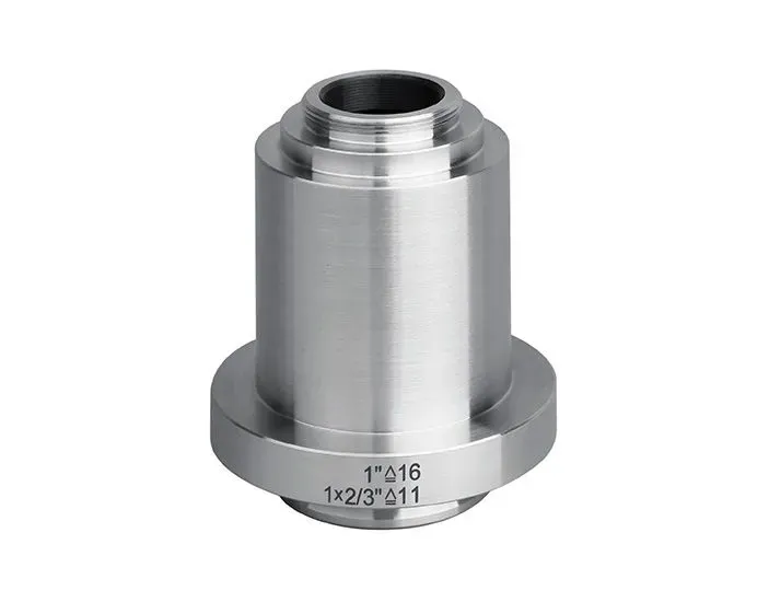 Adaptador de acero inoxidable con base y tapa más pequeña. Grabado con marcas de tamaño.