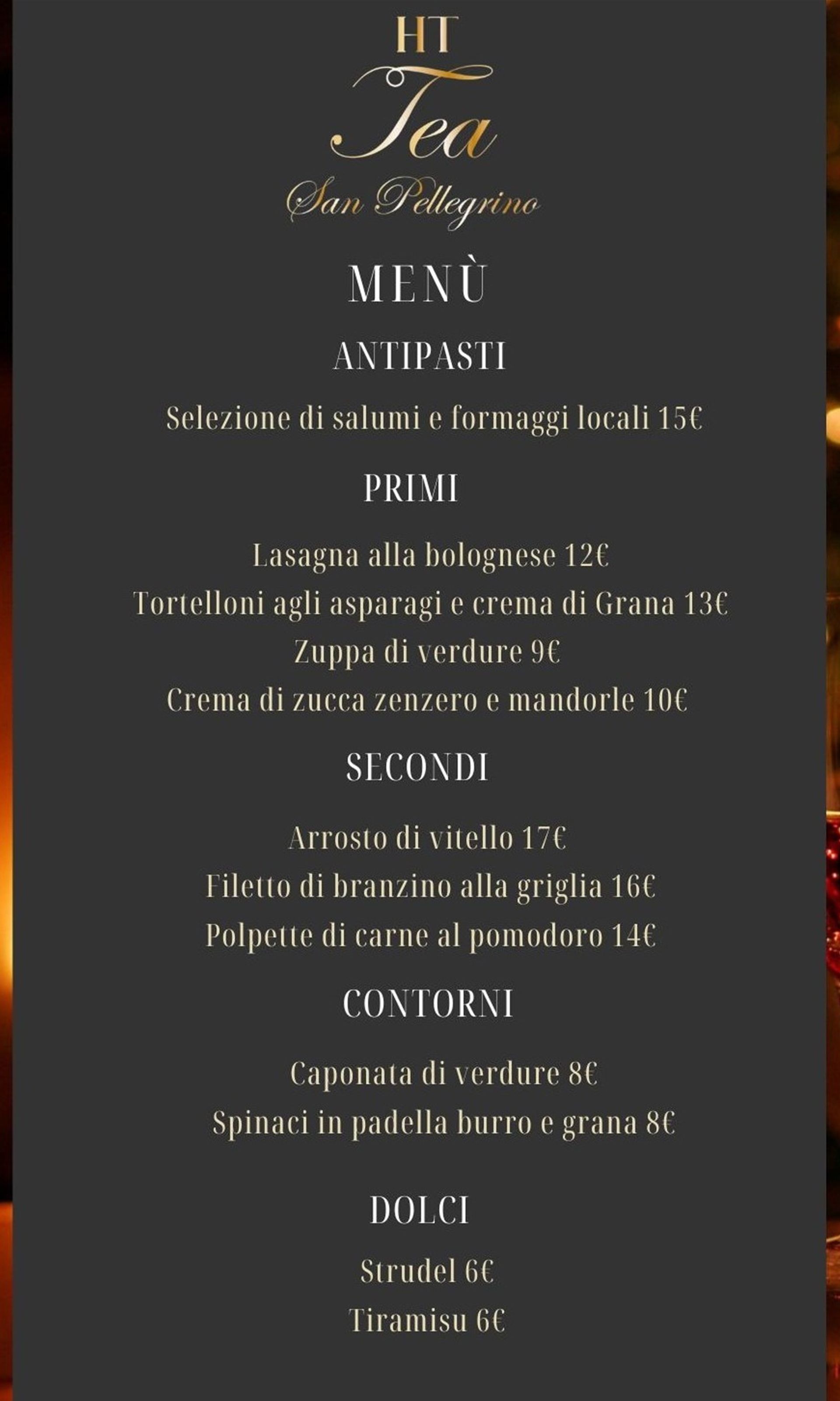Menù del ristorante Teu, con nomi dei piatti e prezzi su sfondo scuro.