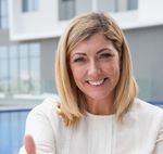Very happy woman feeling at home with StayAroundTheWorld