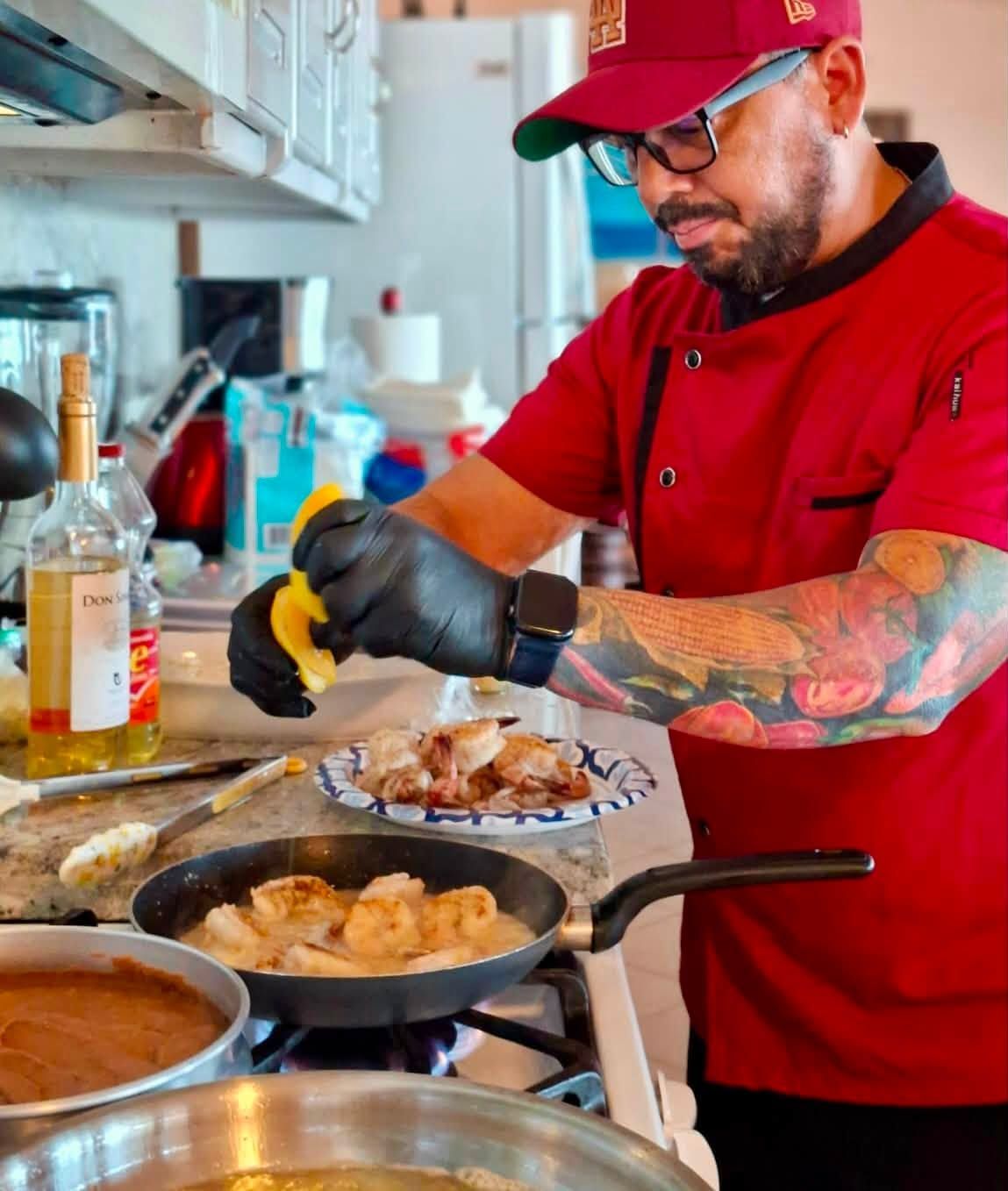Chef César Gerardo preparing a private dinner in Puerto Peñasco