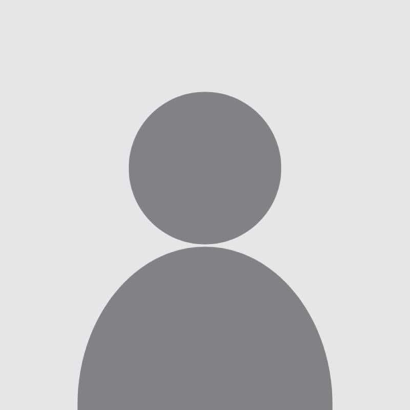 Une silhouette d'une personne sans visage sur fond blanc.