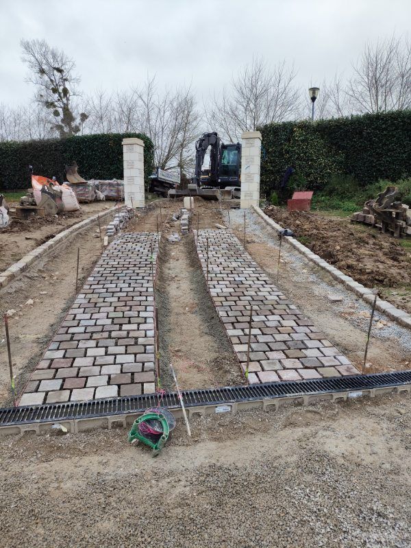 Création de bandes de roulement en pavés 