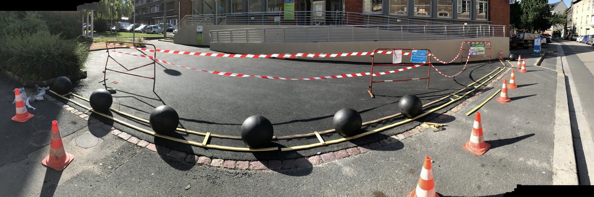 Pose de boules de fonte