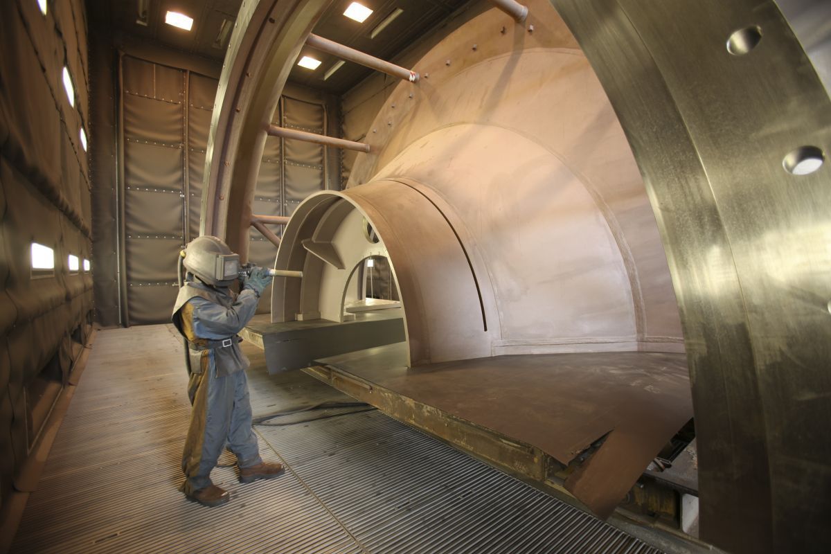 Traitement d'une pièce d'éolienne