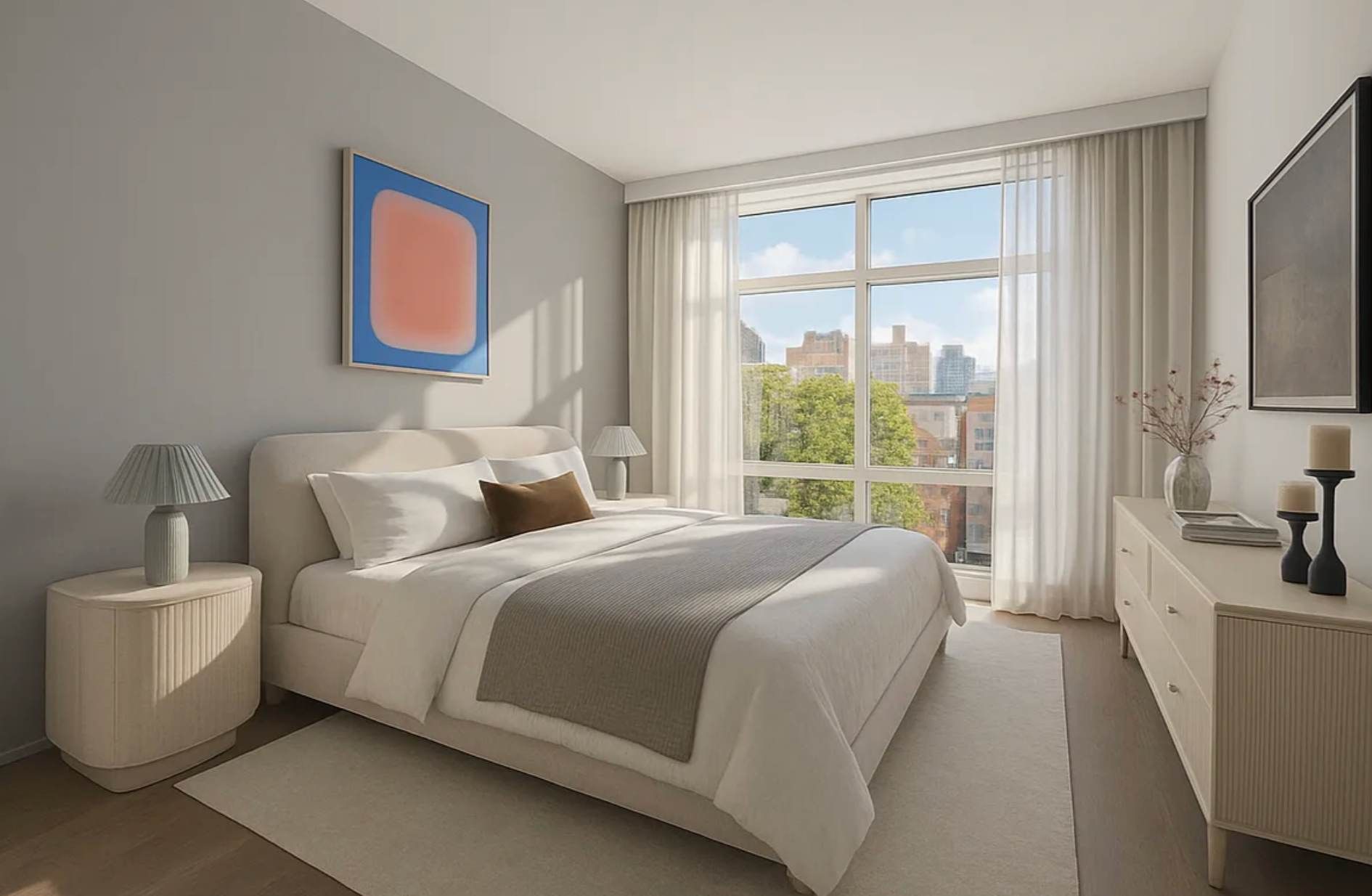 Modern 1-bedroom apartment in Union Square featuring a sleek white kitchen, a dark dining table with white chairs, and a living area with a blue sofa and large windows.