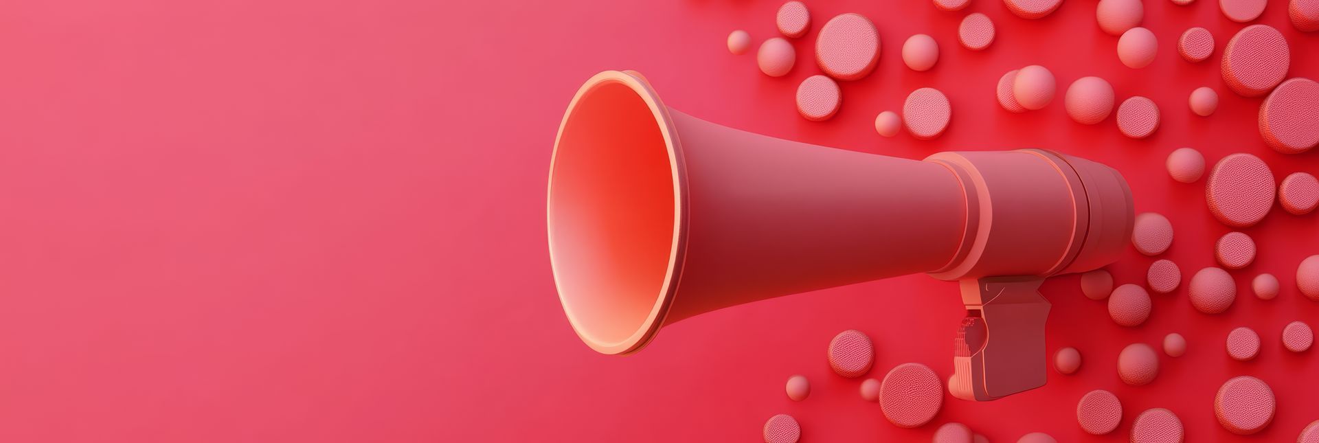 Mégaphone sur fond rose