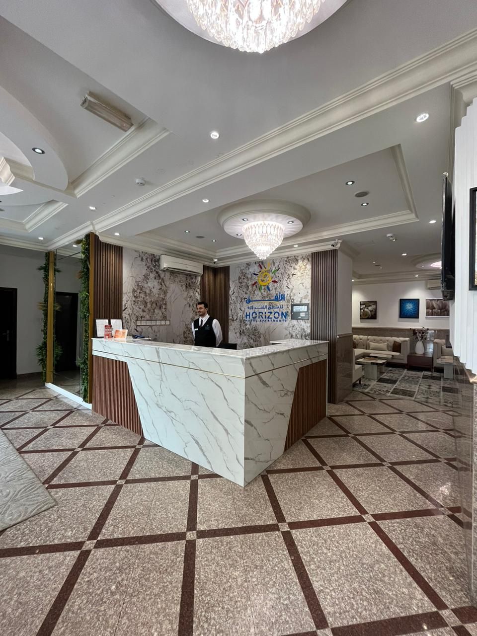 Reception area at Hotel, with stylish furnishings and a welcoming atmosphere.