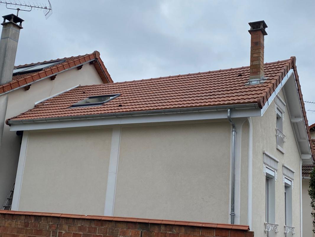 Rénovation de toit en tuiles rouges