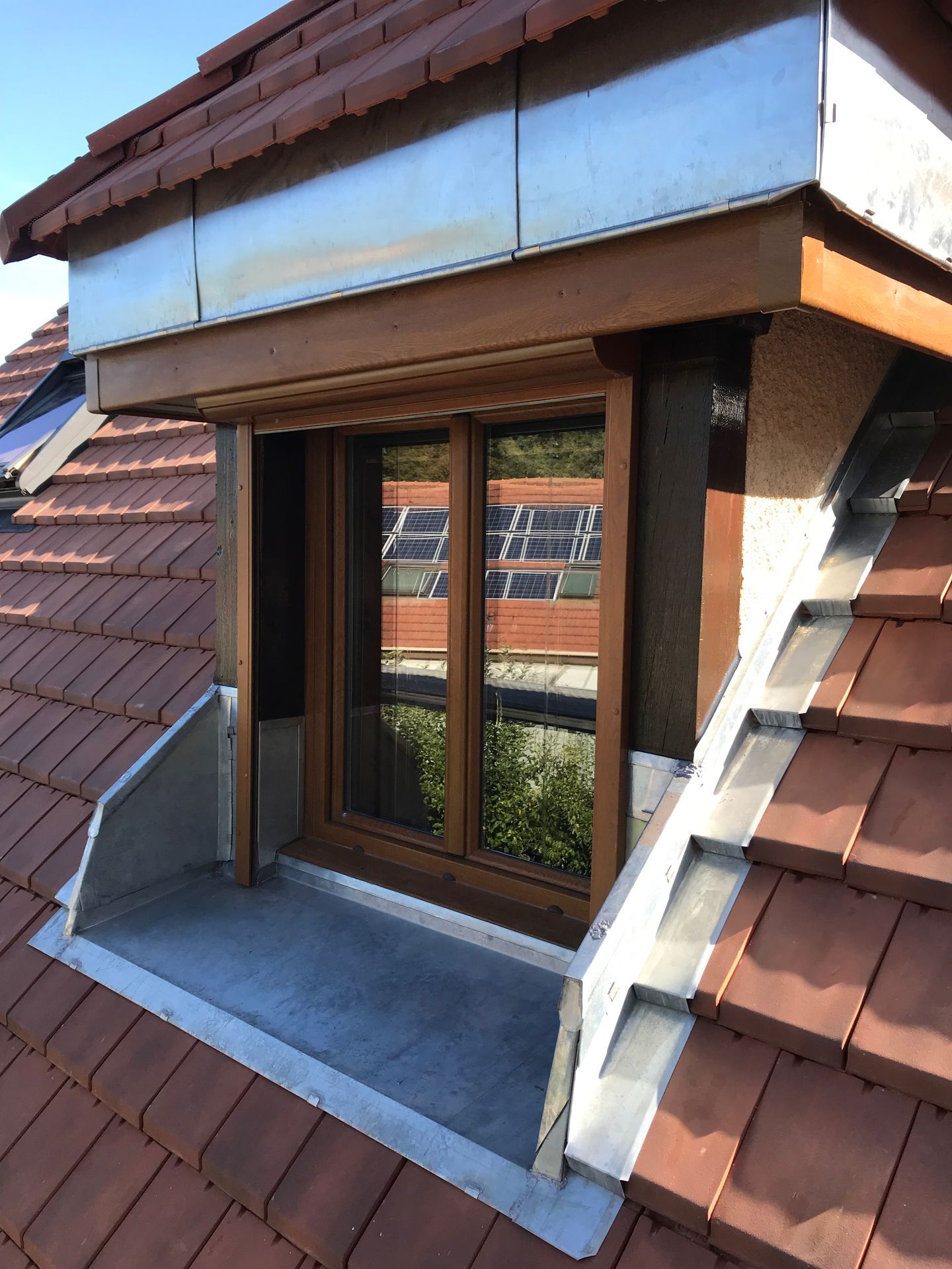 Pose d'élément en zinc