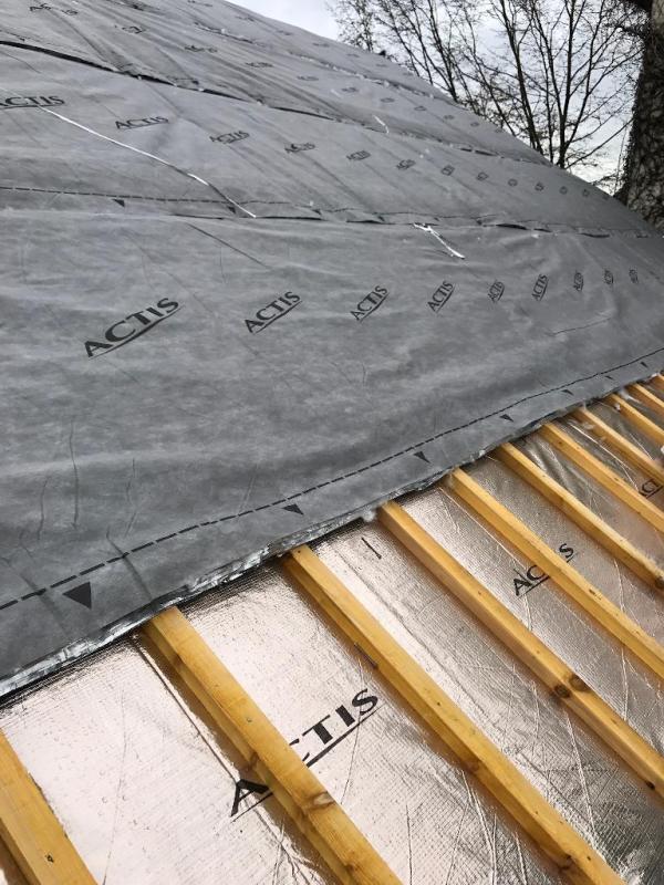 Installation d'isolation de toiture