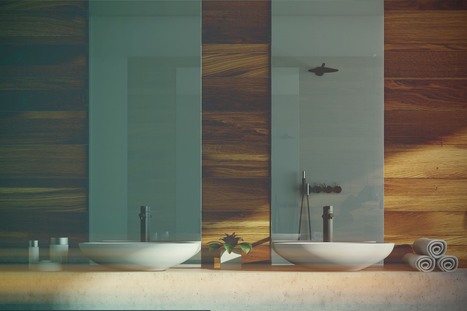 Un baño con dos lavabos, una ducha y un espejo.