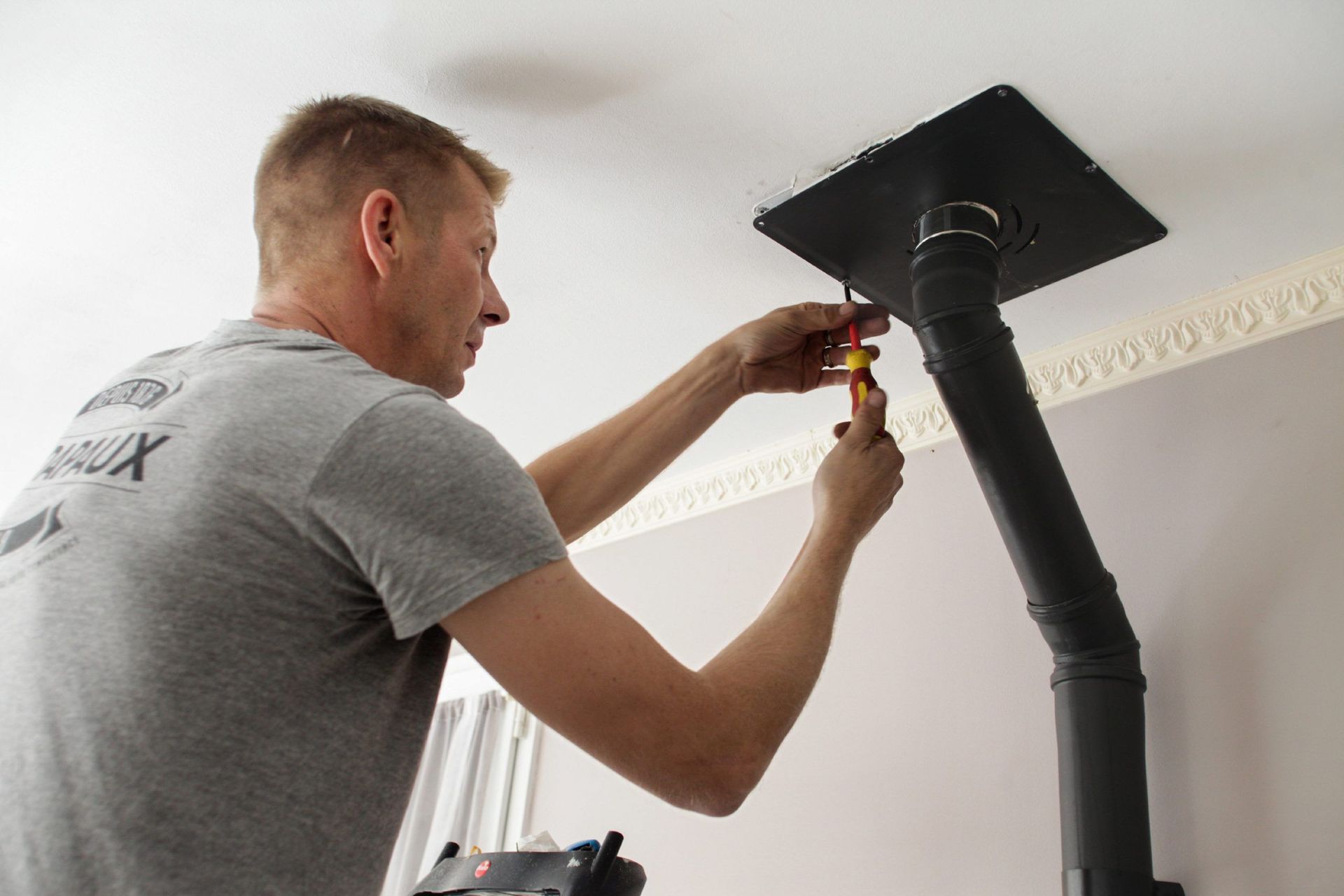 Installation de conduit de poêle