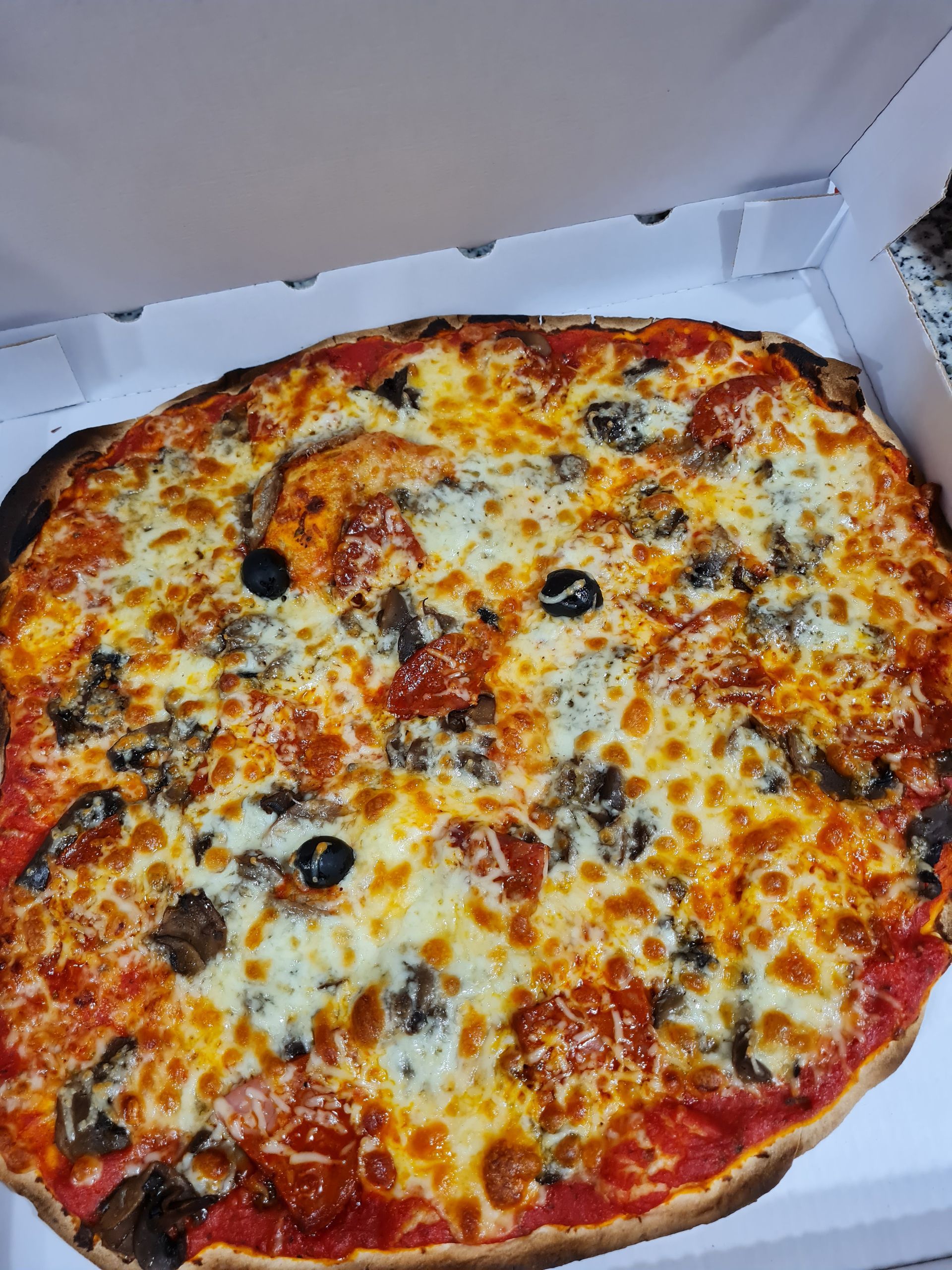 Pizza champignons olives