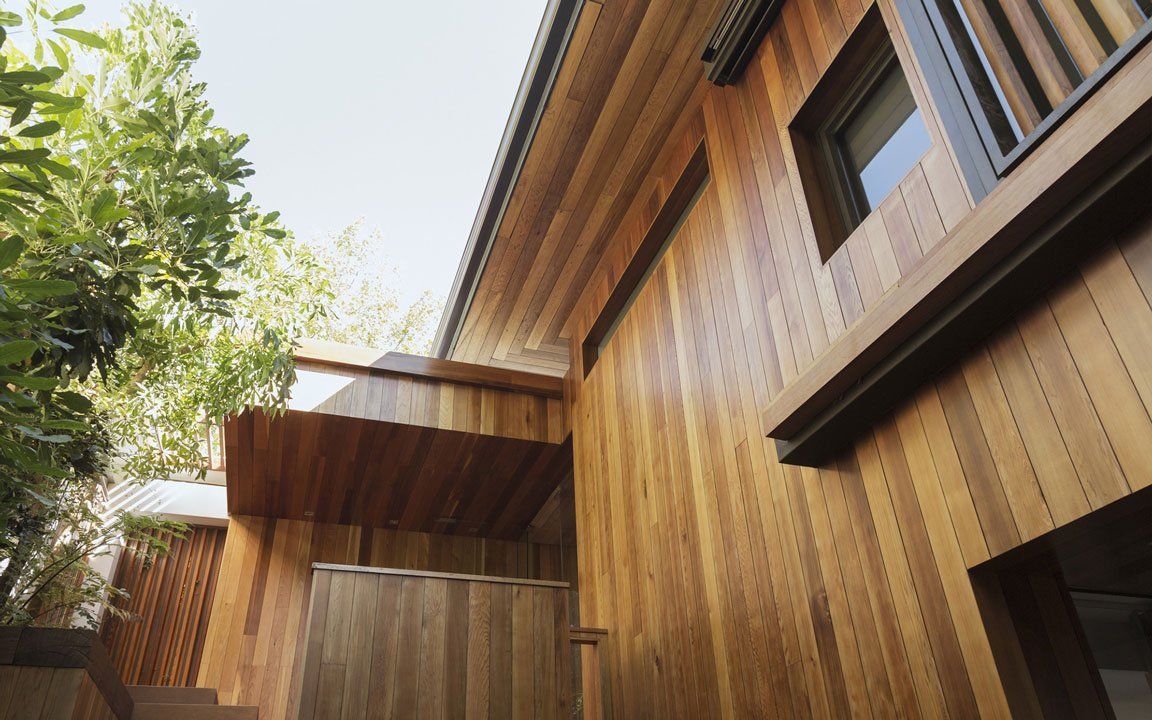 Maison en bois avec extension