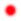 Petit point rouge sur fond blanc