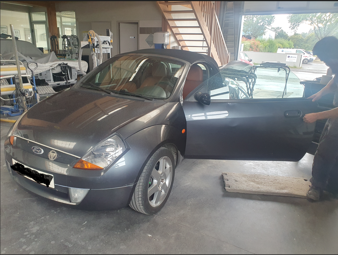 Réparation portière Ford