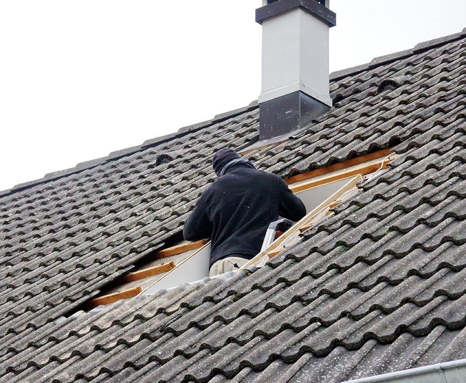 Création d'une fenêtre de toit sur une toiture